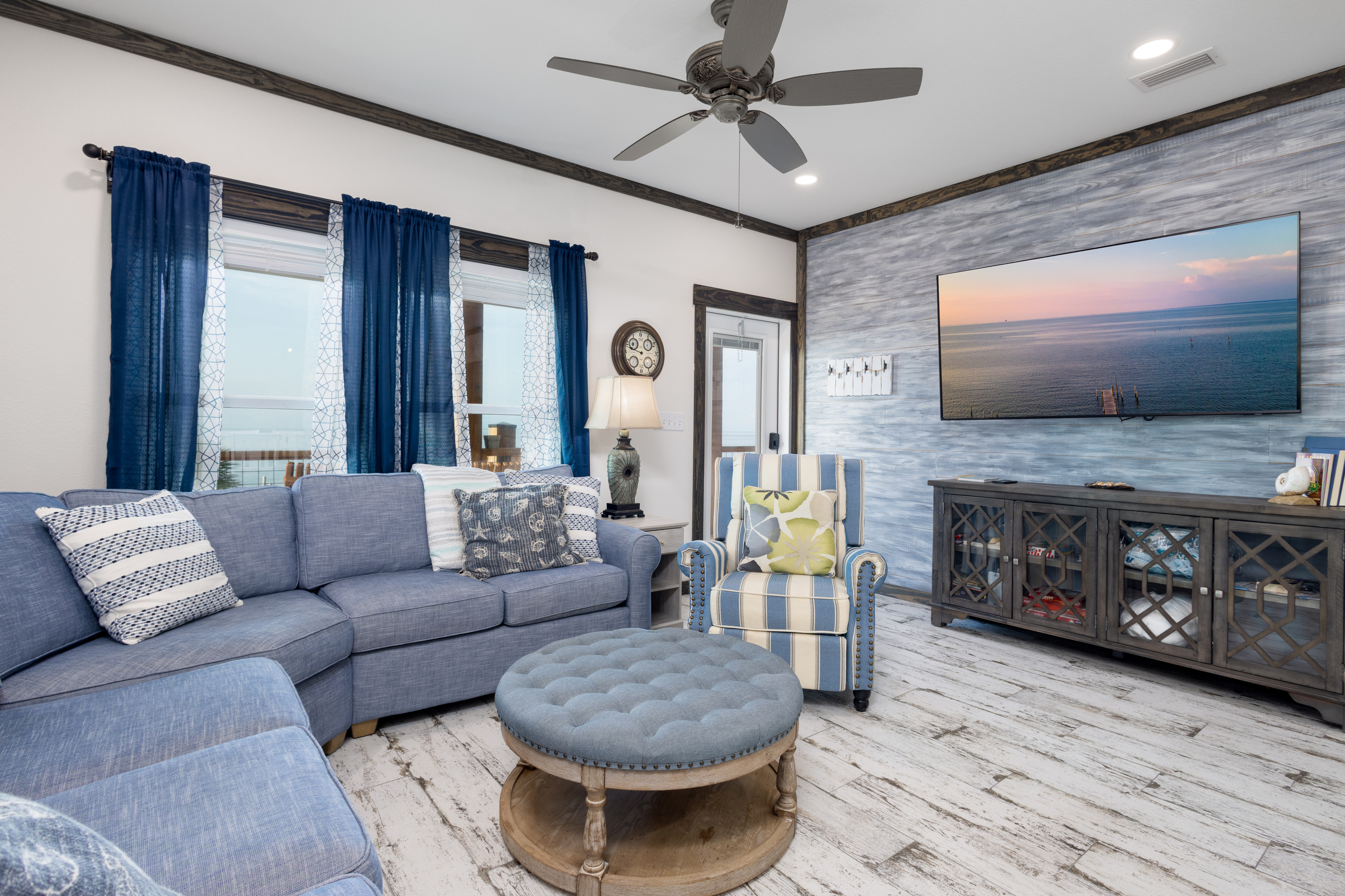 Large tv and plenty of seating with sleepre sofa