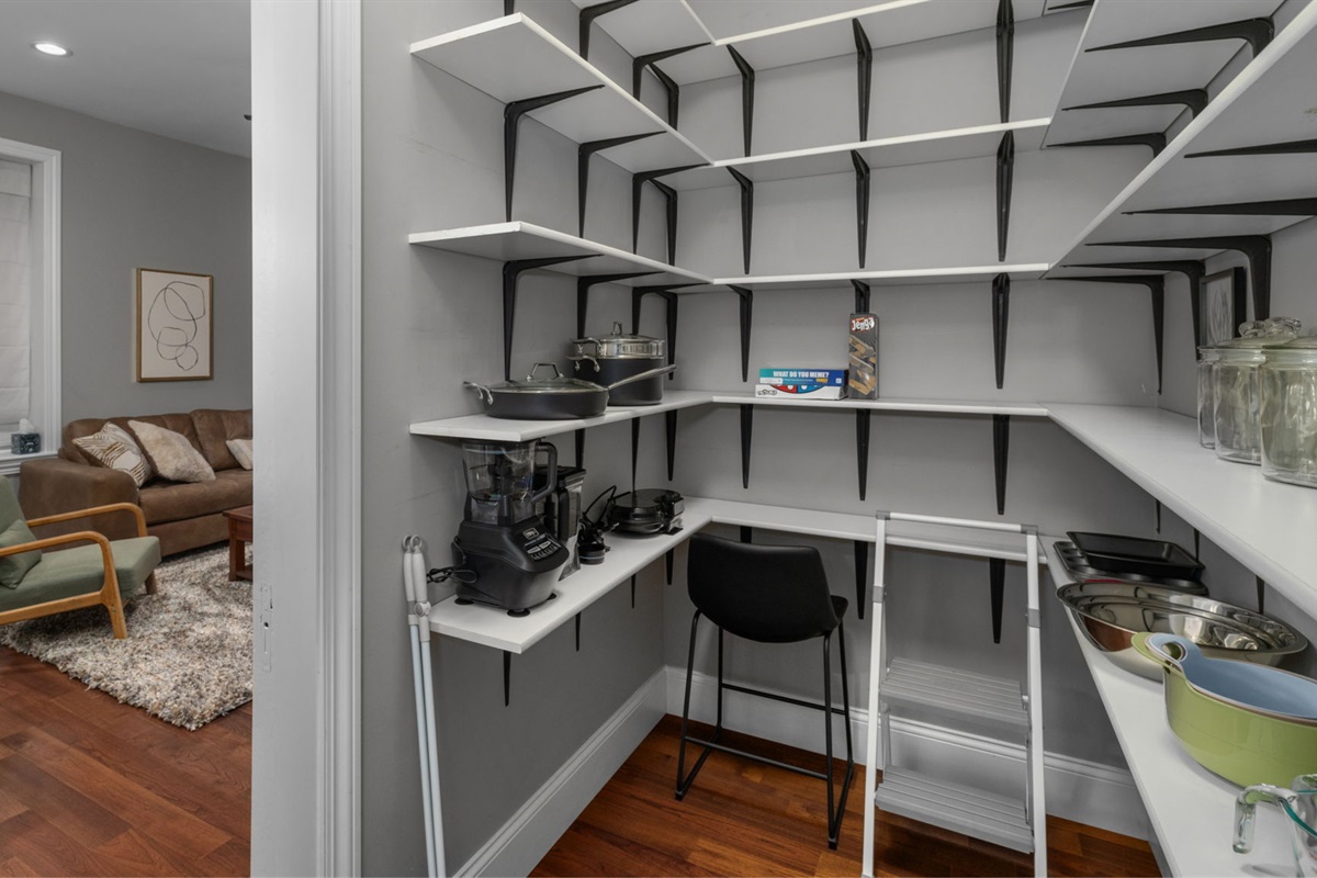 Check out the walk-in pantry for additional supplies, games, and spare beach towels (not all pictured here).