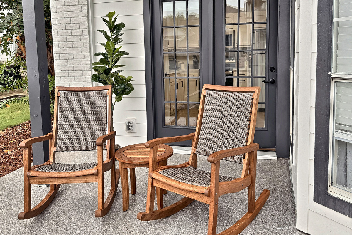 Two rocking chairs on the private ground-floor patio, the morning coffee spot