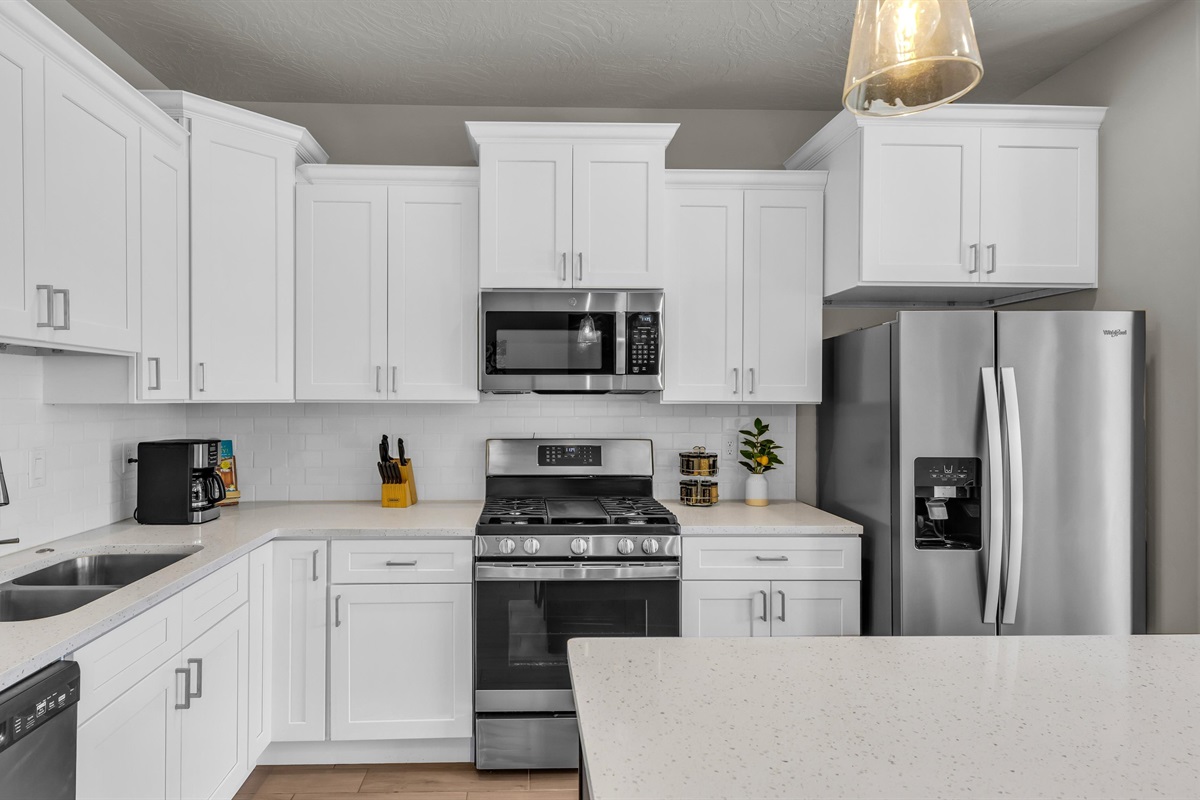 Fully Equipped Kitchen with Gas Range & Stainless Appliances