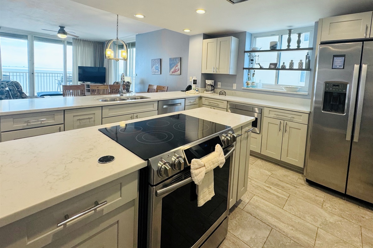 Has coffee maker, blender, dishes, & cookware