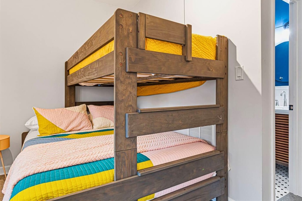 Twin Over Queen Bunk Bed with Bathroom Access