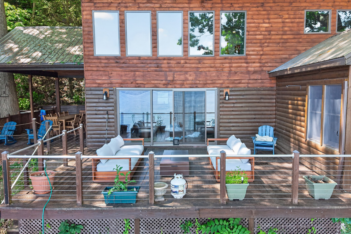 Deck with outdoor seating and glass doors