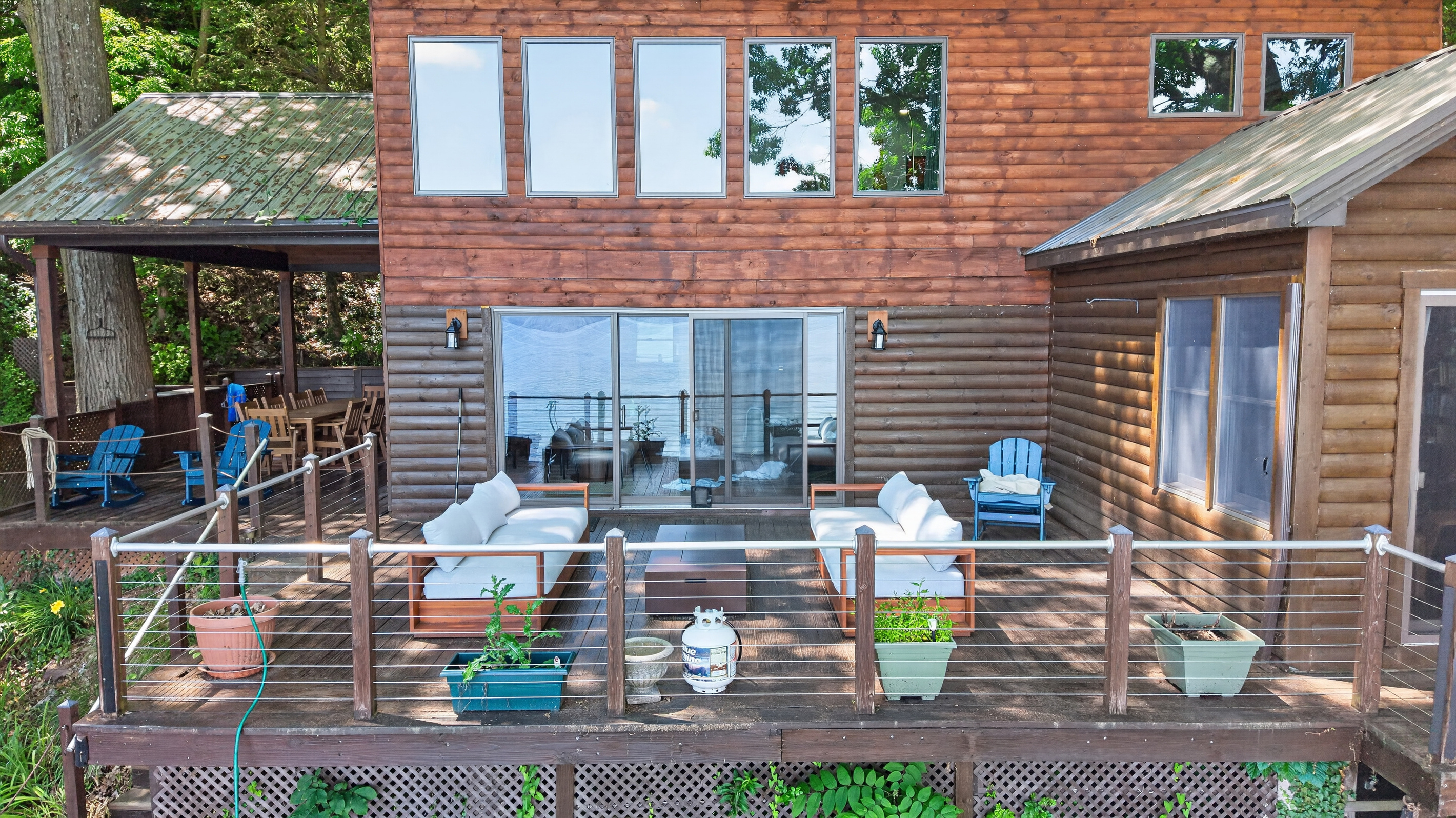 Deck with outdoor seating and glass doors