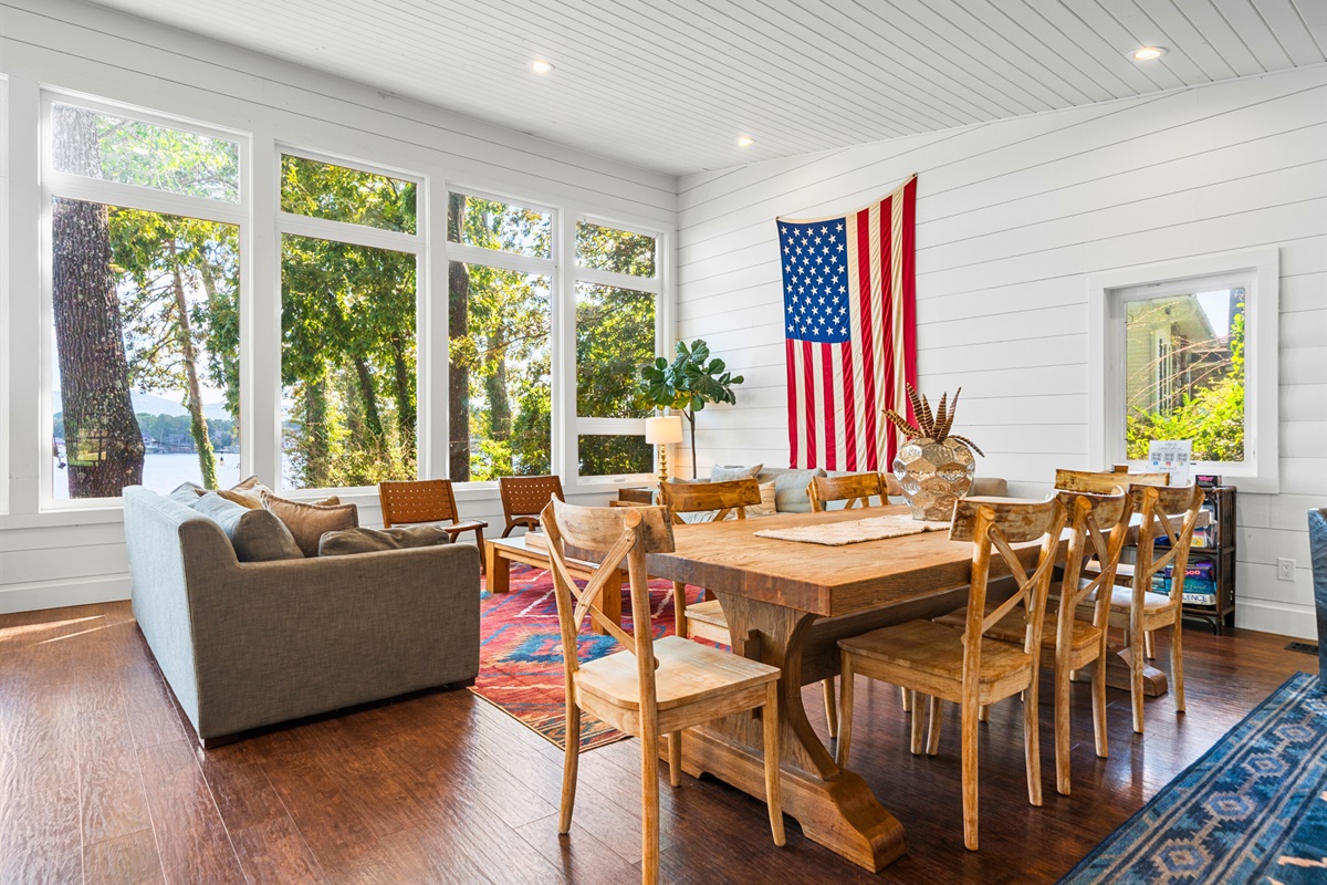 Open dining and living space with huge windows and lake views you’ll love.