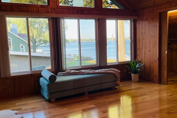 bedroom with panoramic views — the perfect place for morning coffee.