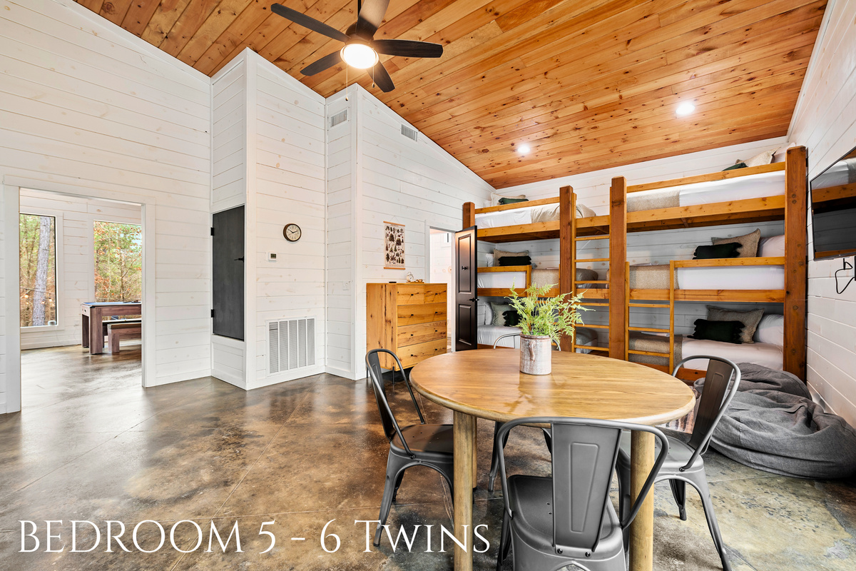 Bunkhouse chic! This spacious room is where memories are made, with enough beds for all your favorite people.