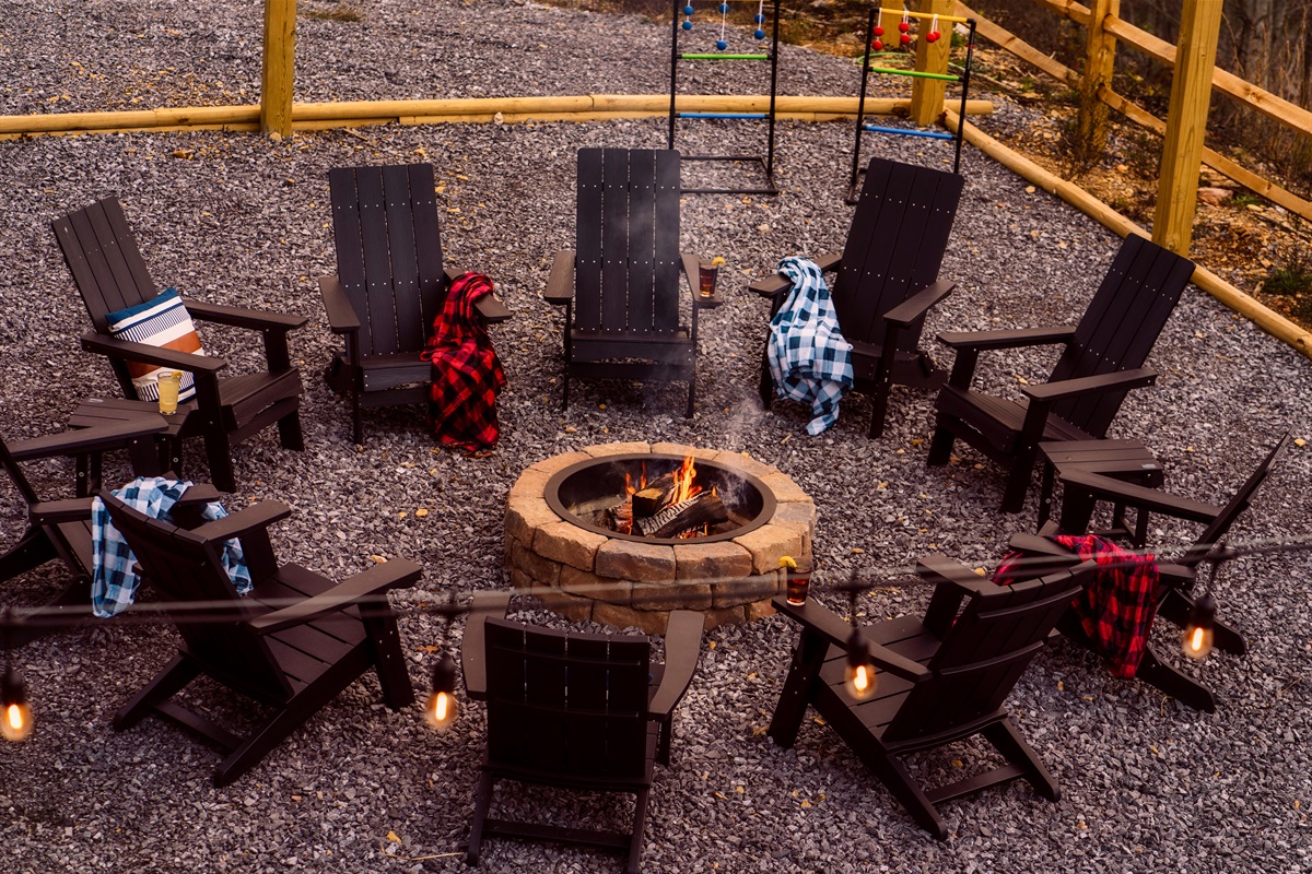 Fire Pit in backyard with picnic tables & views