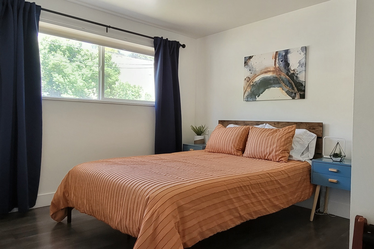 The second bedroom has a queen bed.