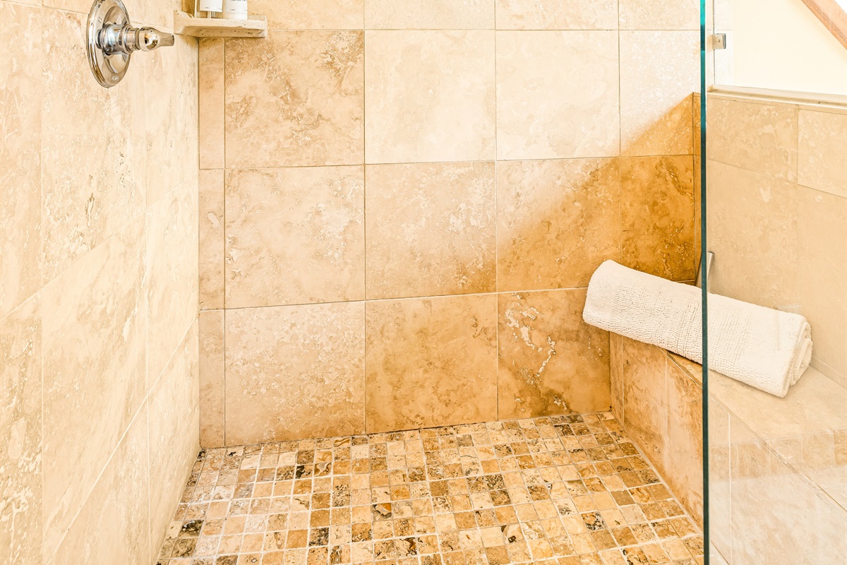 Mobility challenges? Unsteady? We've made bathing easy! Take a seat and enjoy the hand shower and relax!