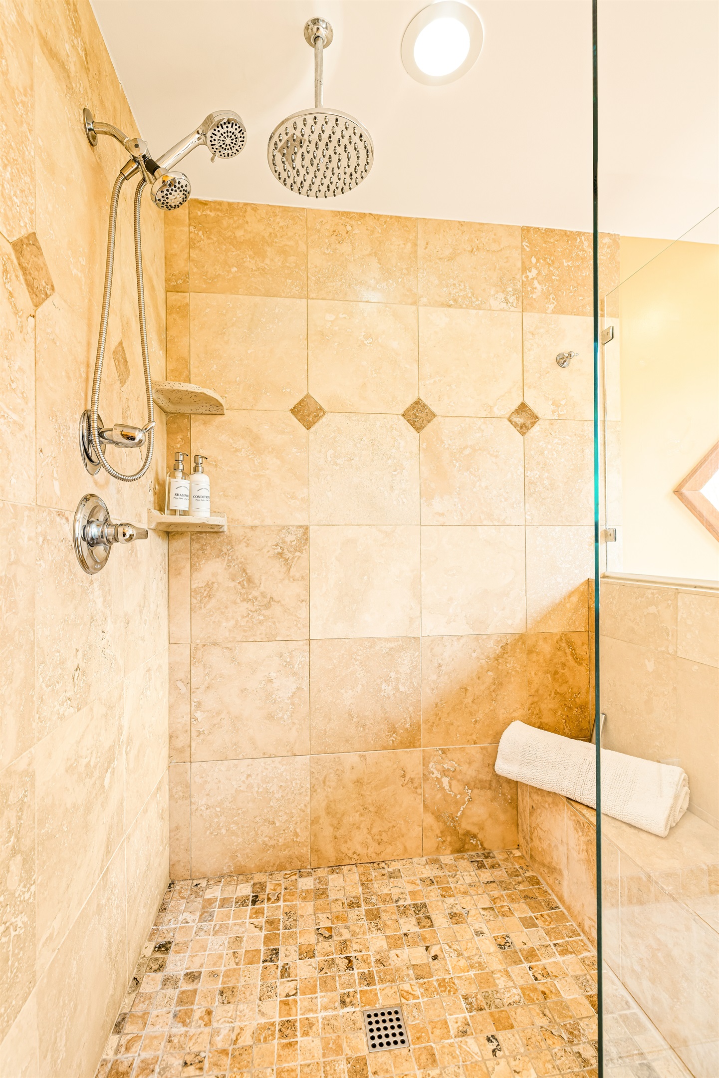 Mobility challenges? Unsteady? We've made bathing easy! Take a seat and enjoy the hand shower and relax!