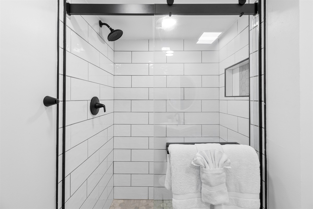 Bathroom off of the hall by the fourth bedroom