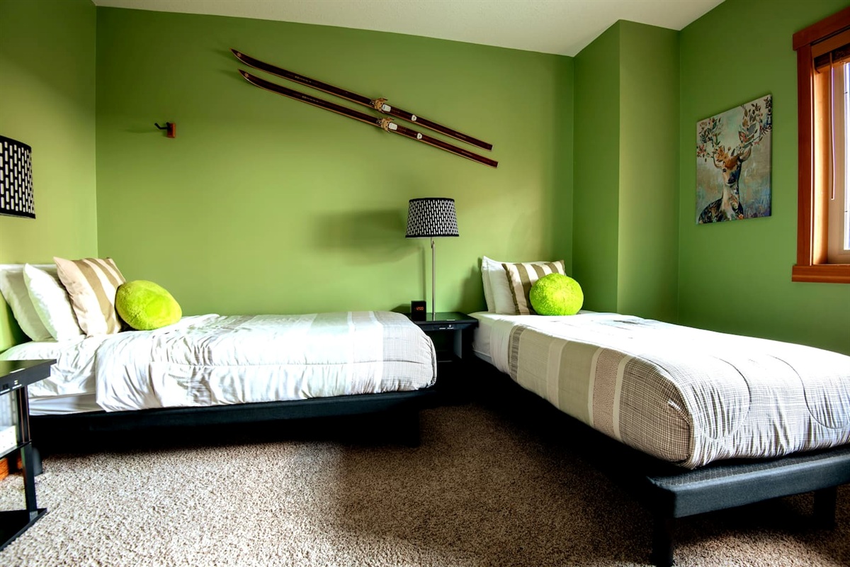 2nd bedroom, Two Twin XL beds, shown in an L configuration, you can slide them together, and  convert into a King bed for longer stays.