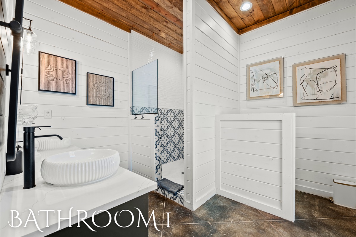 The spa-inspired ensuite bathroom features a luxurious soaking tub, modern fixtures, and plenty of space to refresh and recharge.