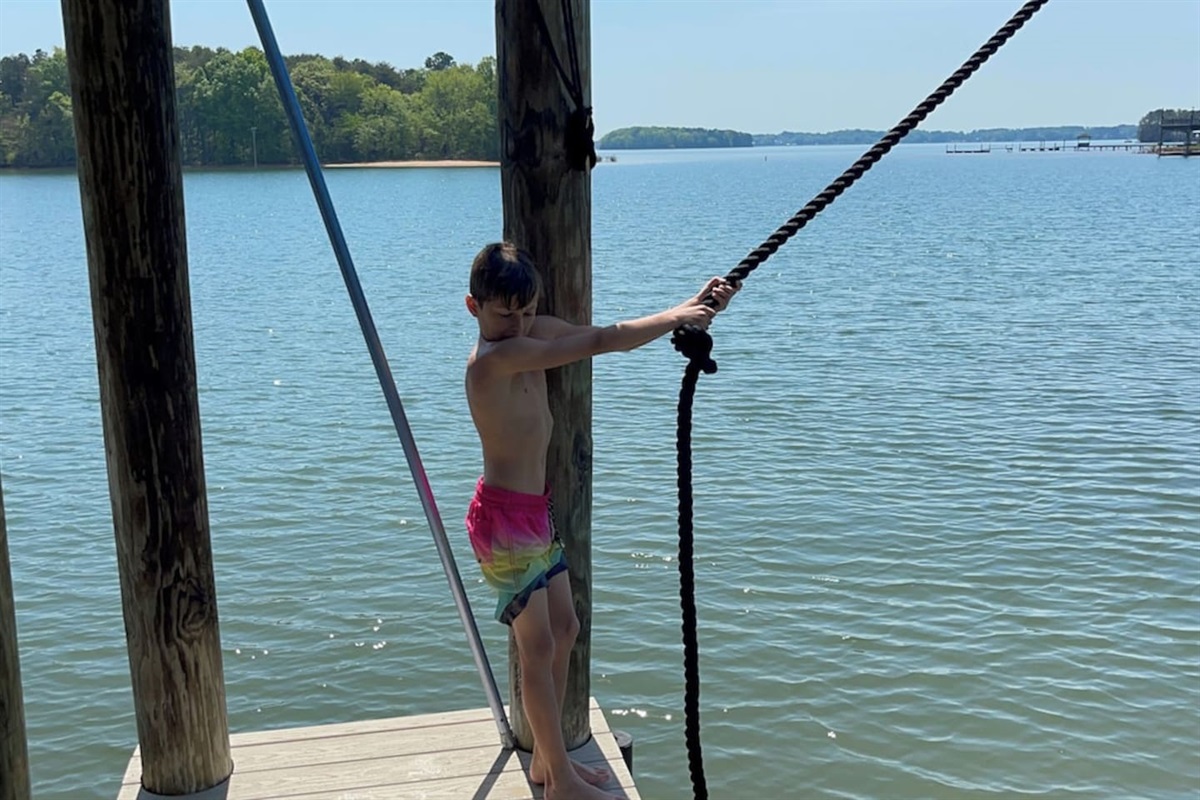 Dock mounted rope swing is ready for you and your guests.