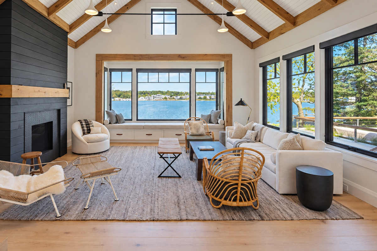 Living room with fireplace and water views