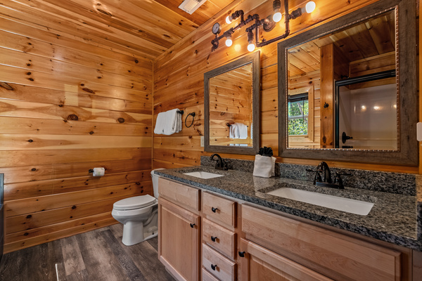 Upstairs ensuite bathroom with separate tub and walk-in shower