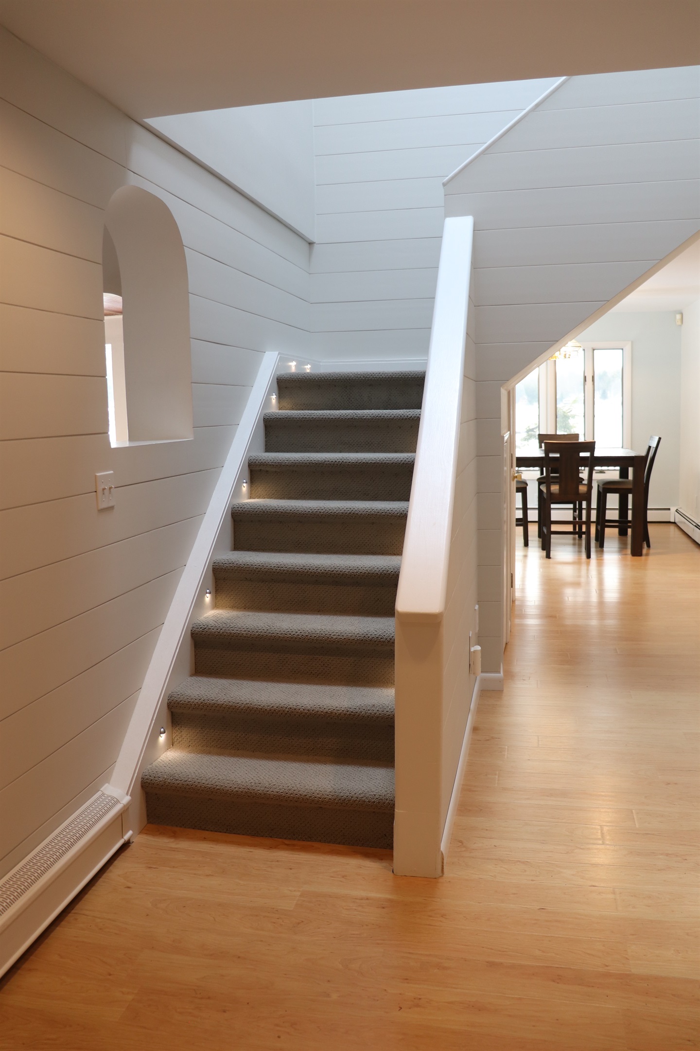 Main Entry way - stairs leading to west wing upstairs.