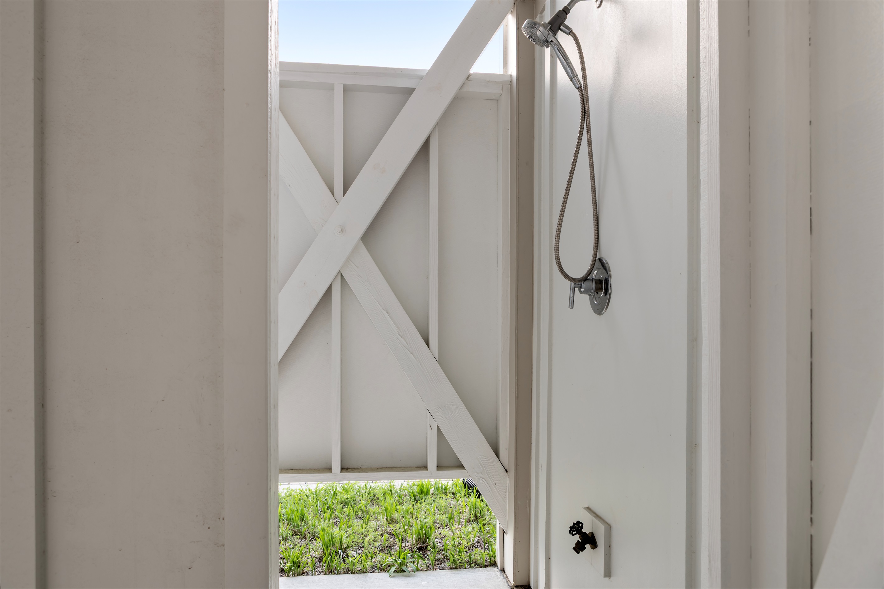 Private outdoor shower to wash away the salt and sand