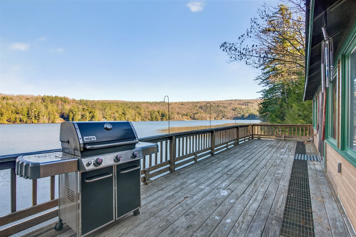 Outdoor BBQ grill area with plenty of prep space — ideal for cooking and enjoying meals outside by the lake