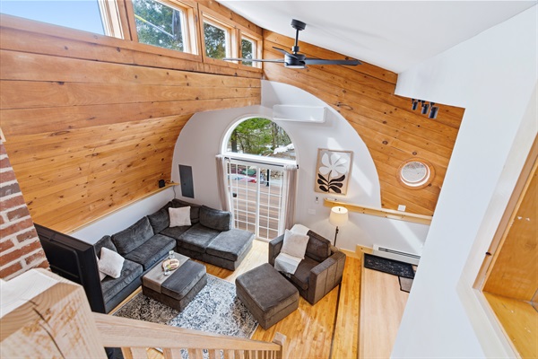 Cozy up in the inviting living room, complete with plush seating, warm lighting, and the perfect spot to relax after a day of adventure.