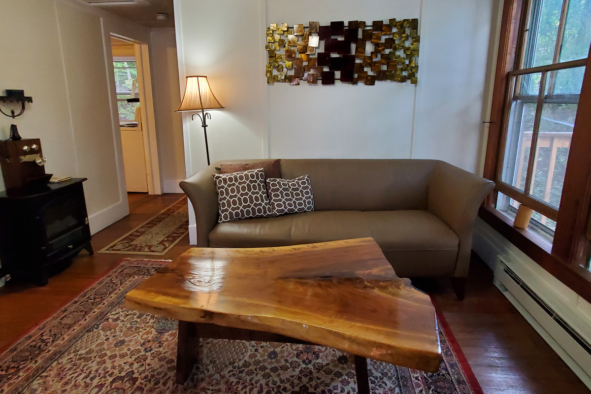 Boathouse living room with live-edge coffee table