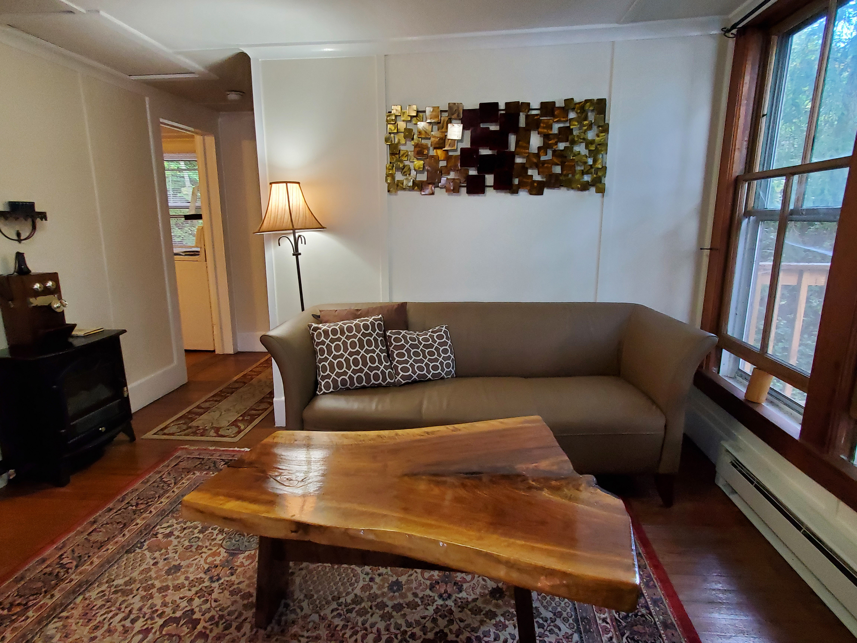 Boathouse living room with live-edge coffee table