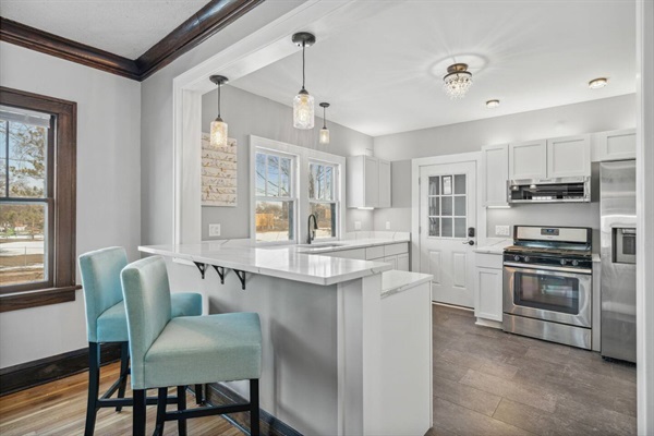 Barstools overlooking kitchen
