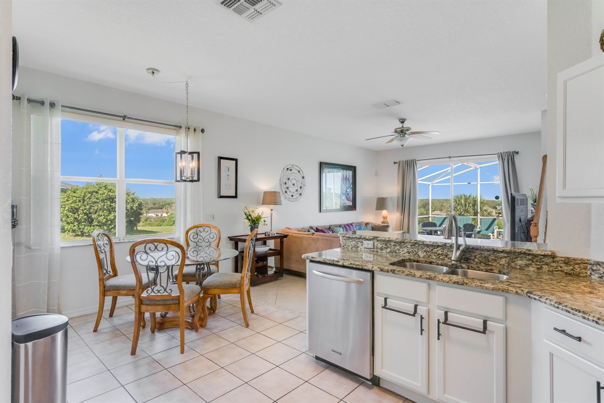 The sitting room is just behind the kitchen and breakfast nook.