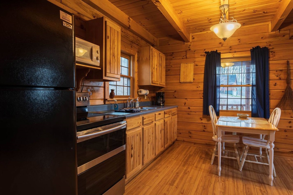 This kitchen comes with a stove, microwave, refrigerator, coffee maker, and toaster, along with all the necessary culinary tools to delight your taste buds.
