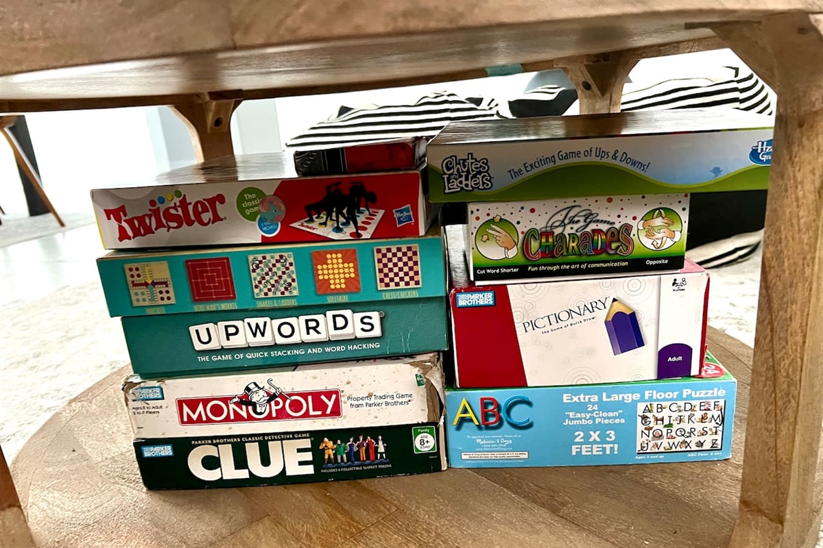 Many board games located now in kitchens closet. Many toys and more games located in the closet in the room with two beds 