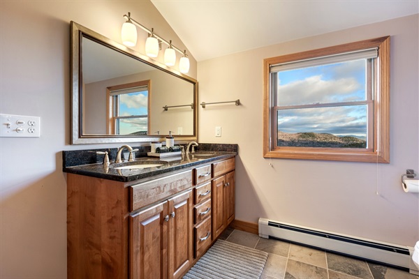 More room, more relaxation! Two vanity sinks offer convenience and style for a smooth start to your day.