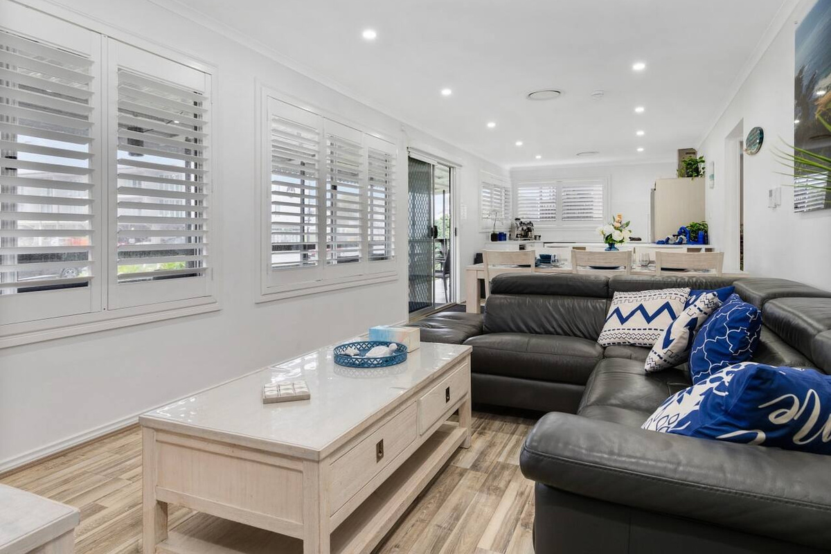Skye’s Beach House Malua Bay features an upstairs living, dining and kitchen area, with water views from the kitchen windows.
