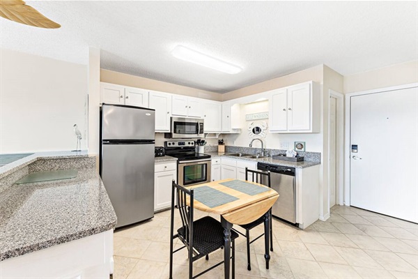 Full sized kitchen fully equipped.