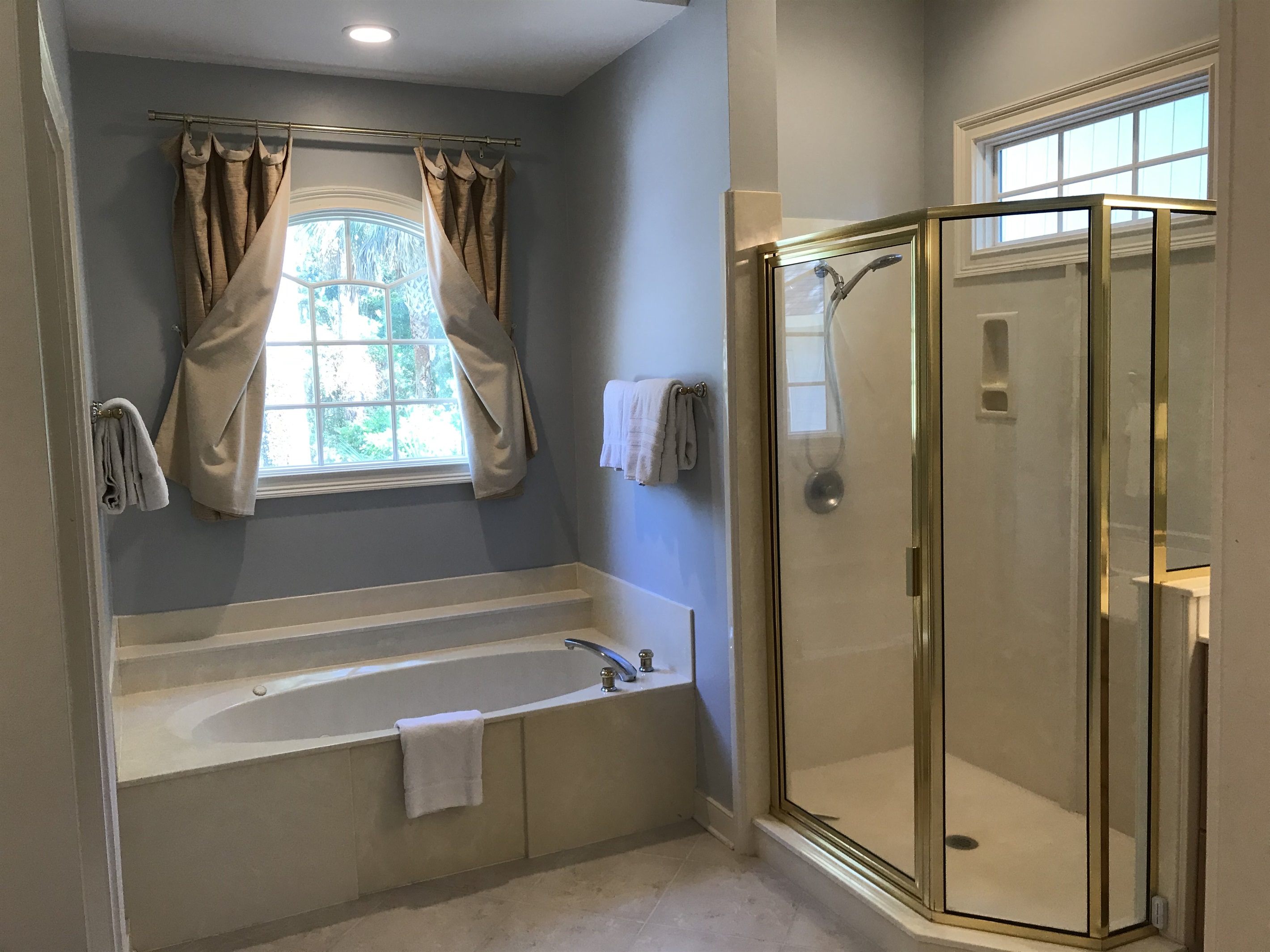 Separate tub, shower and water closet