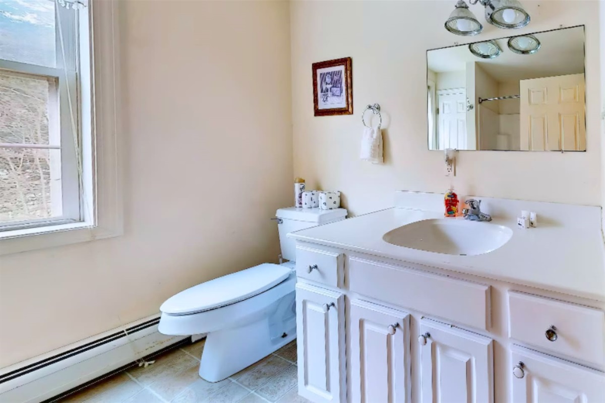 Full bathroom on second floor of the home between the 2 bedrooms!