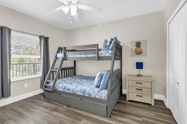 Bunk Bedroom with double, twin trundle and twin on top. Smart TV.