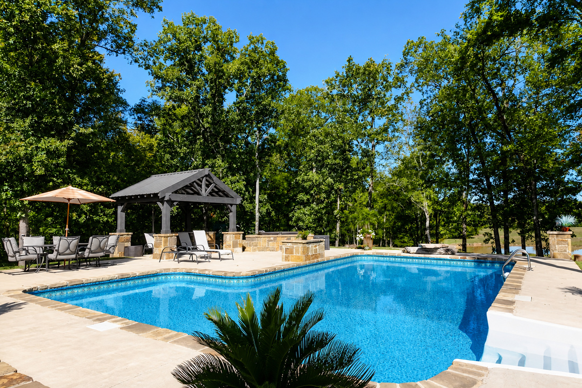 The pool area has a covered patio, hot tub, and a fire pit for all your outdoor fun.