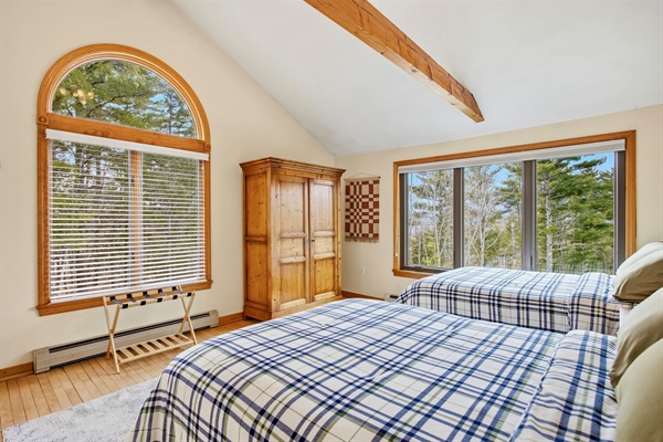 Second floor bedroom with two double beds view 2