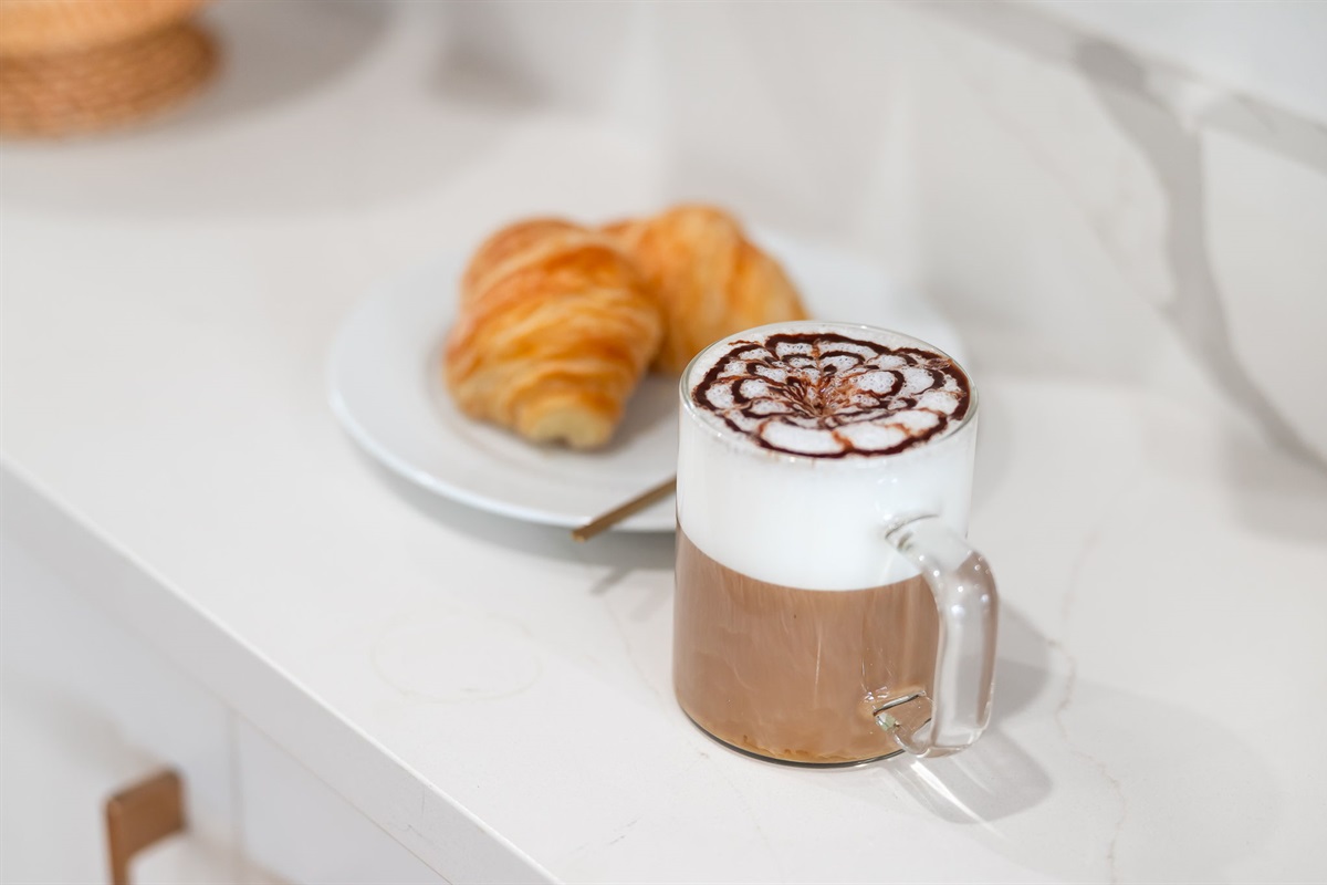 Enjoy your morning cup steps from the pool or with a cozy indoor view.