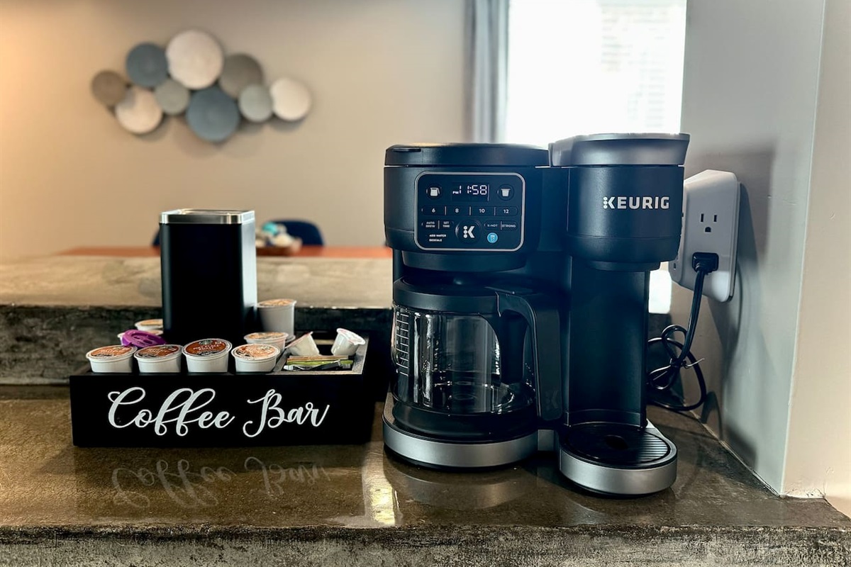 Coffee Bar with Keurig, drip and pour over coffee. Get your stay started with the provided "starter pack" that includes K-cups, coffee beans, assorted teas, sweeteners and creamer.