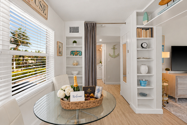 Bright dining area with natural light and an easy flow to the living space.
