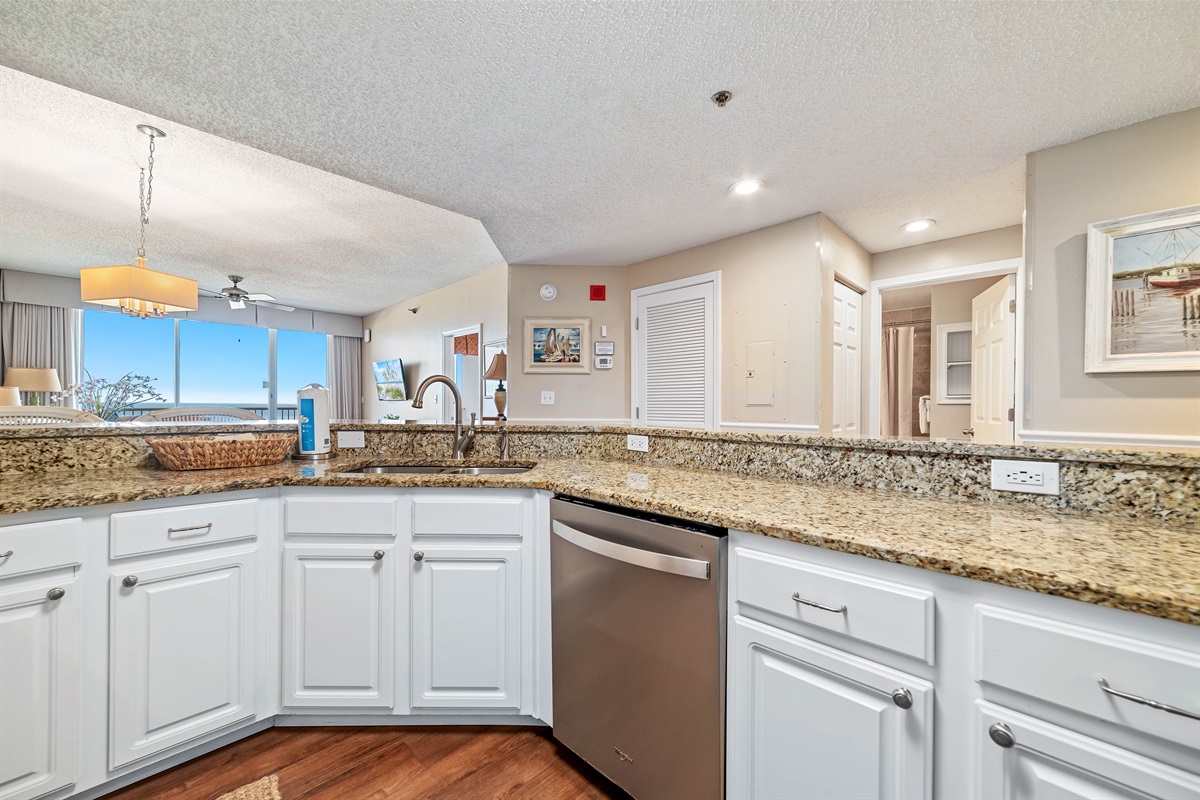 Clean lines and modern finishes define this well-appointed kitchen, offering a sleek and stylish cooking environment.