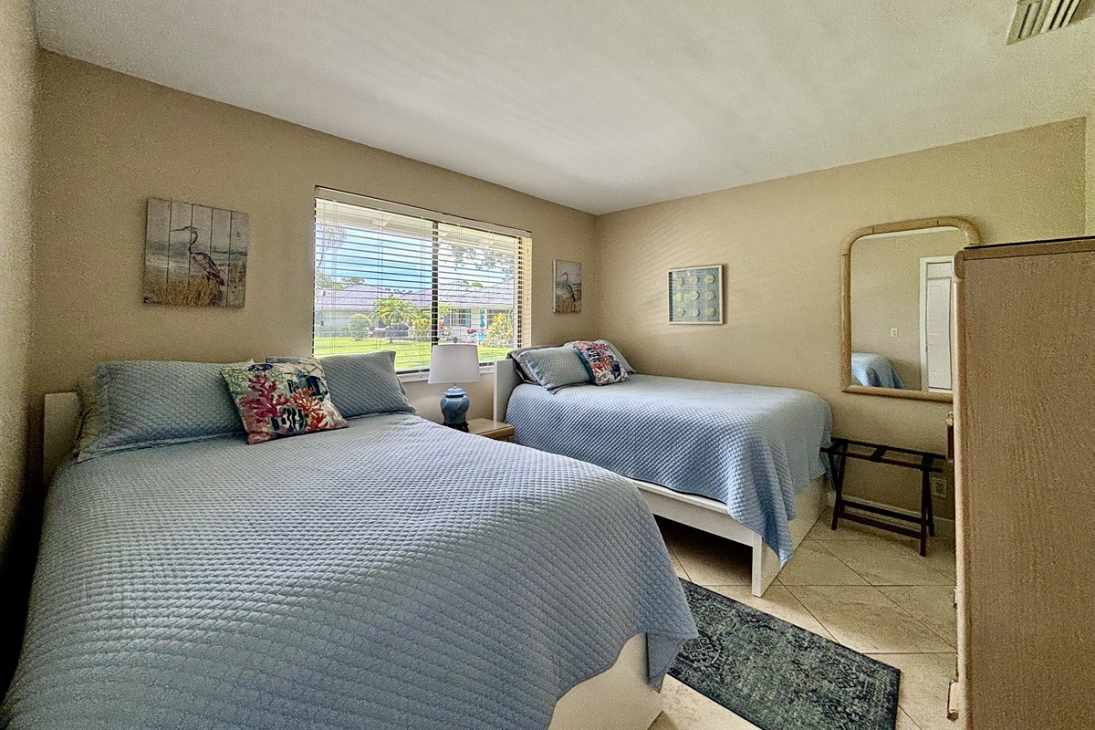 The front bedroom has two twin beds, a closet and dresser for plenty of storage during the course of your stay.
