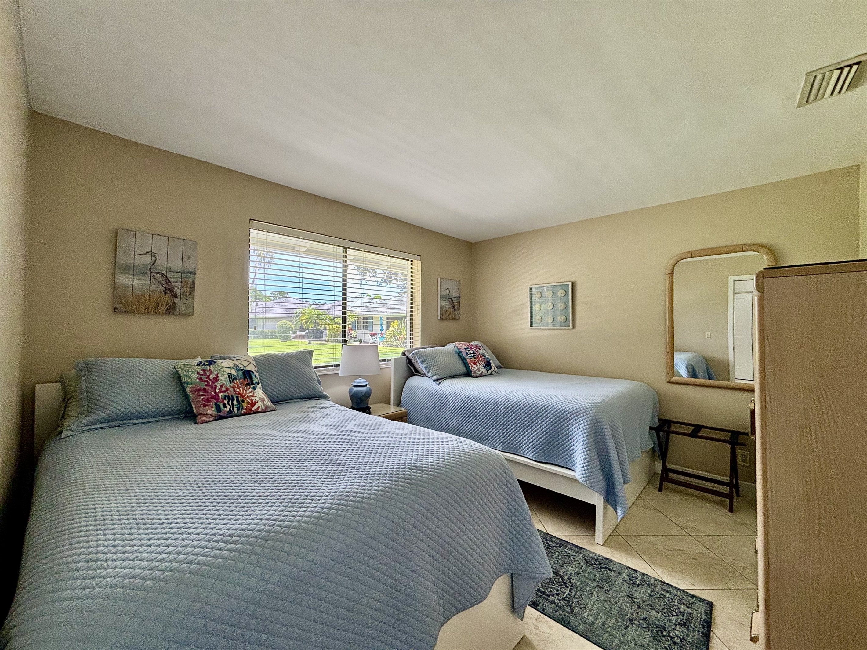 The front bedroom has two twin beds, a closet and dresser for plenty of storage during the course of your stay.