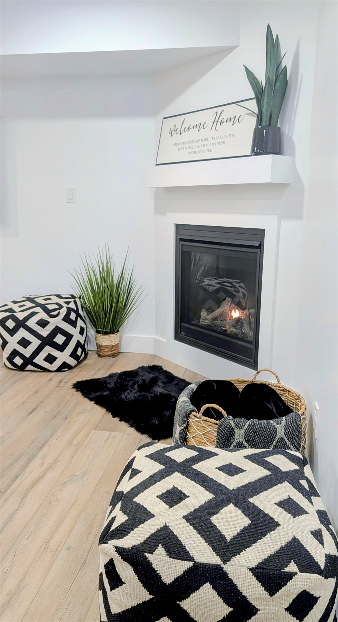 Downstairs living room fireplace.