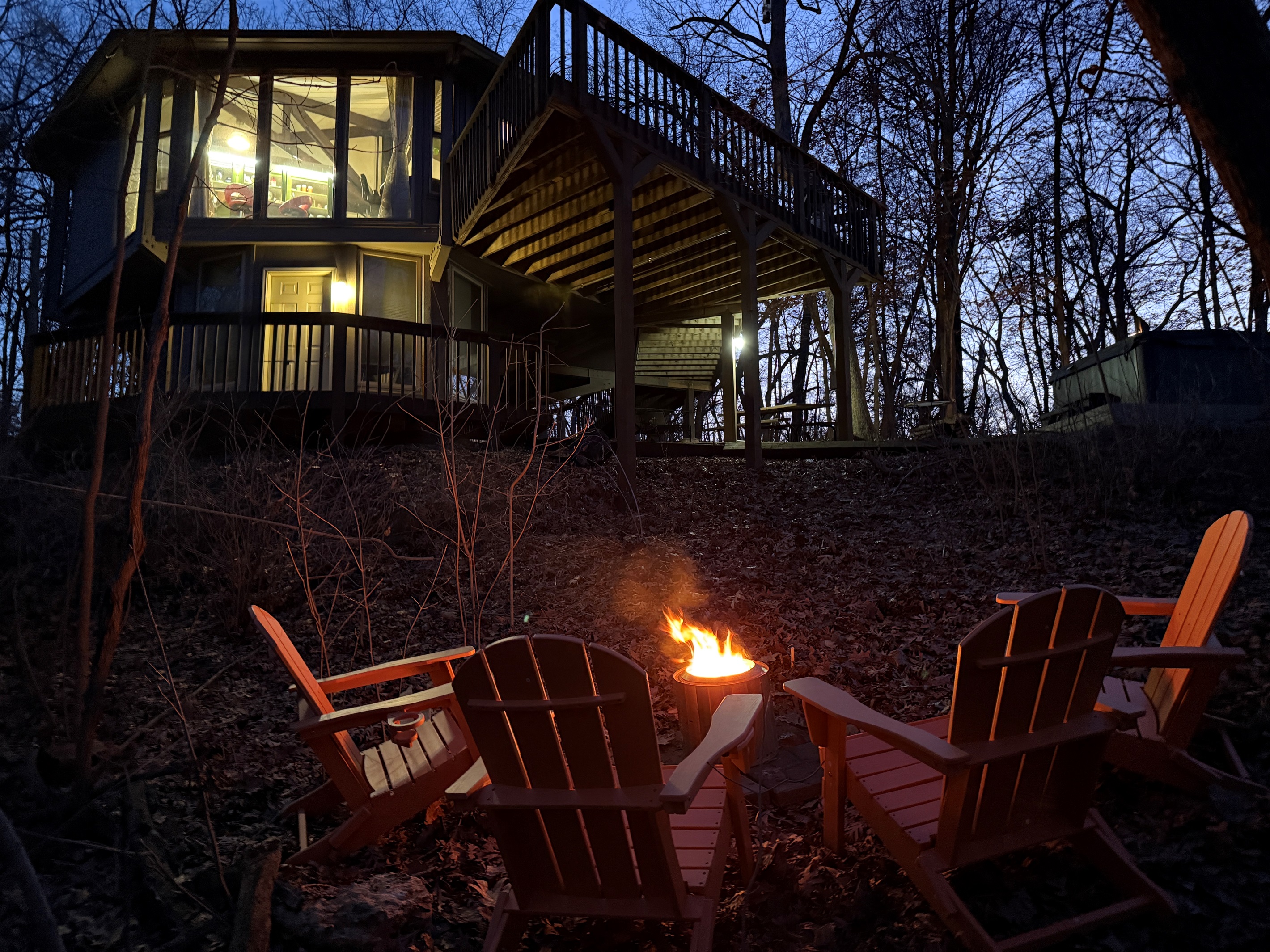 Enjoy a nice fire in the woods, appreciate the unique octagon shape of the house!