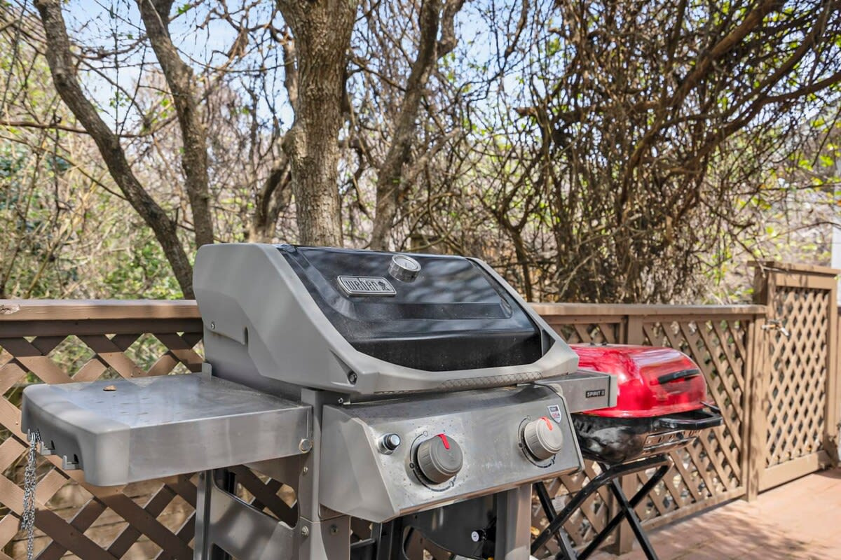 The propane grill lives out on the deck, ready for whatever came back from the fish counter. Fire it up, pour something cold, and let dinner outdoors run on until the light has gone entirely from the sky.