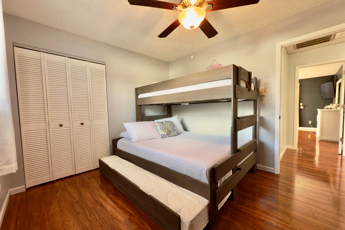 Twin XL over Queen bunk with Twin XL trundle — ideal for a small family or kids sharing a room.