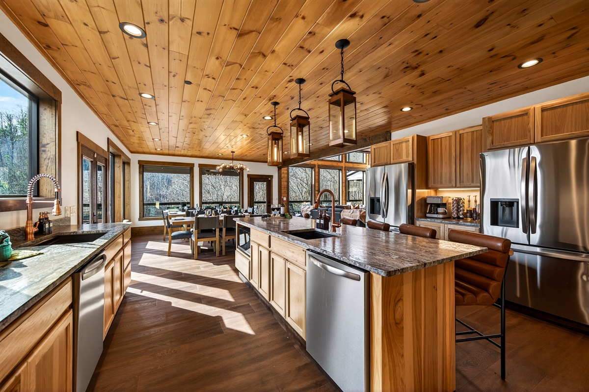 🍽️ Chef’s Kitchen– This fully stocked kitchen is designed for gathering & entertaining, featuring 2 full-size refrigerators, 4 ovens, 2 dishwashers, 2 microwaves & 2 sinks, plus a coffee bar. Perfect for preparing meals for the whole group.